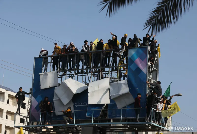 Palestinian supporters of the Fatah movement take part during a rally marking the 58th anniversary of the creation of the political party, in Gaza city, on December 31, 2022. Photo by Ashraf Amra\ apaimages