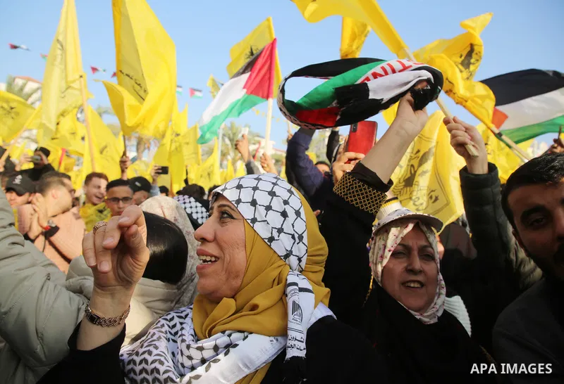 Palestinian supporters of the Fatah movement take part during a rally marking the 58th anniversary of the creation of the political party, in Gaza city, on December 31, 2022. Photo by Ashraf Amra\ apaimages
