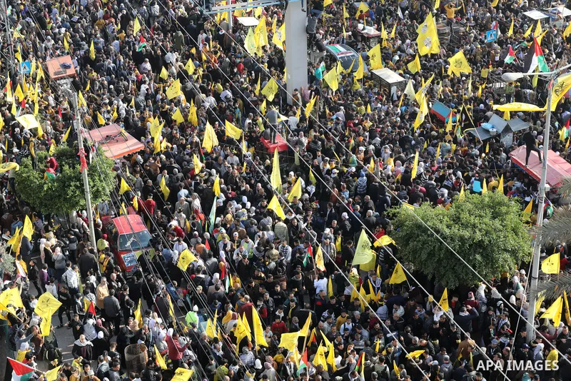 Palestinian supporters of the Fatah movement take part during a rally marking the 58th anniversary of the creation of the political party, in Gaza city, on December 31, 2022. Photo by Ashraf Amra\ apaimages