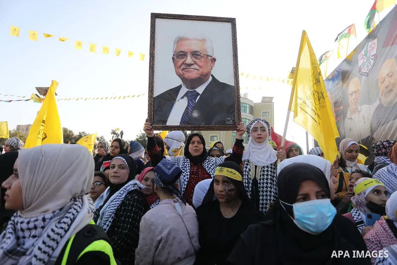 Palestinian supporters of the Fatah movement take part during a rally marking the 58th anniversary of the creation of the political party, in Gaza city, on December 31, 2022. Photo by Ashraf Amra\ apaimages