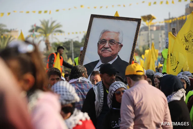 Palestinian supporters of the Fatah movement take part during a rally marking the 58th anniversary of the creation of the political party, in Gaza city, on December 31, 2022. Photo by Ashraf Amra\ apaimages