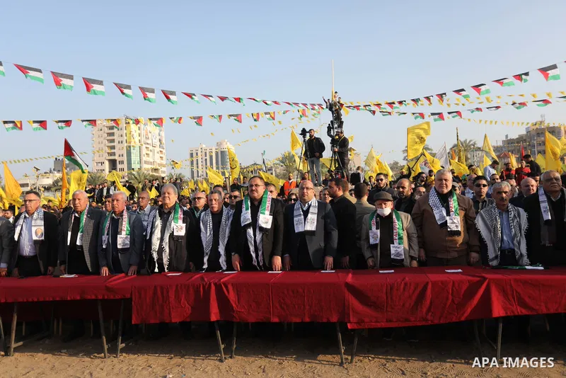 Palestinian supporters of the Fatah movement take part during a rally marking the 58th anniversary of the creation of the political party, in Gaza city, on December 31, 2022. Photo by Ashraf Amra\ apaimages