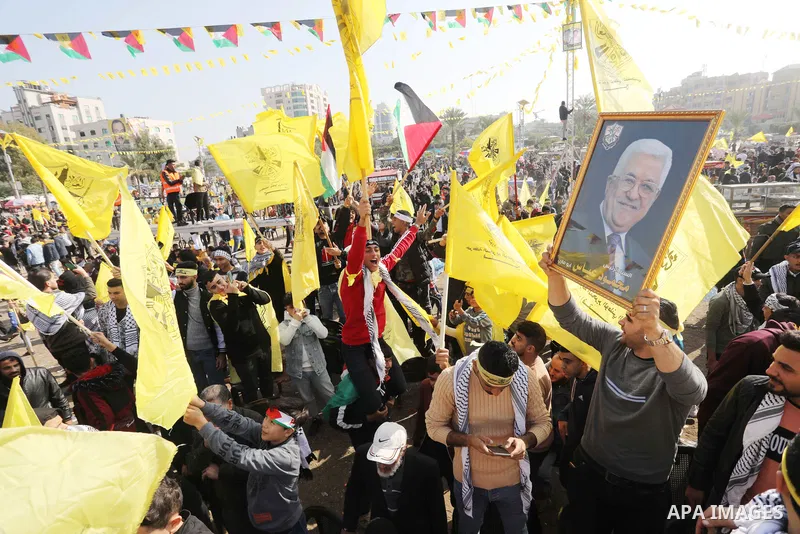 Palestinian supporters of the Fatah movement take part during a rally marking the 58th anniversary of the creation of the political party, in Gaza city, on December 31, 2022. Photo by Ashraf Amra\ apaimages