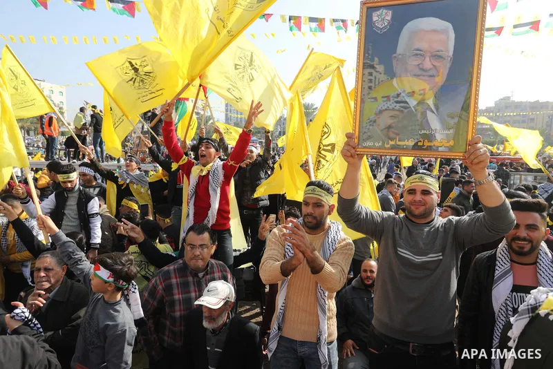 Palestinian supporters of the Fatah movement take part during a rally marking the 58th anniversary of the creation of the political party, in Gaza city, on December 31, 2022. Photo by Ashraf Amra\ apaimages