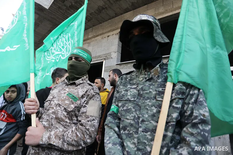 Supporters of Palestinian Islamic Hamas movement take part in a rally in support of Jerusalem and West Bank, in al-Bureij refugee camp in the central Gaza Strip on December 30, 2022. A total of 146 Palestinians were kill...