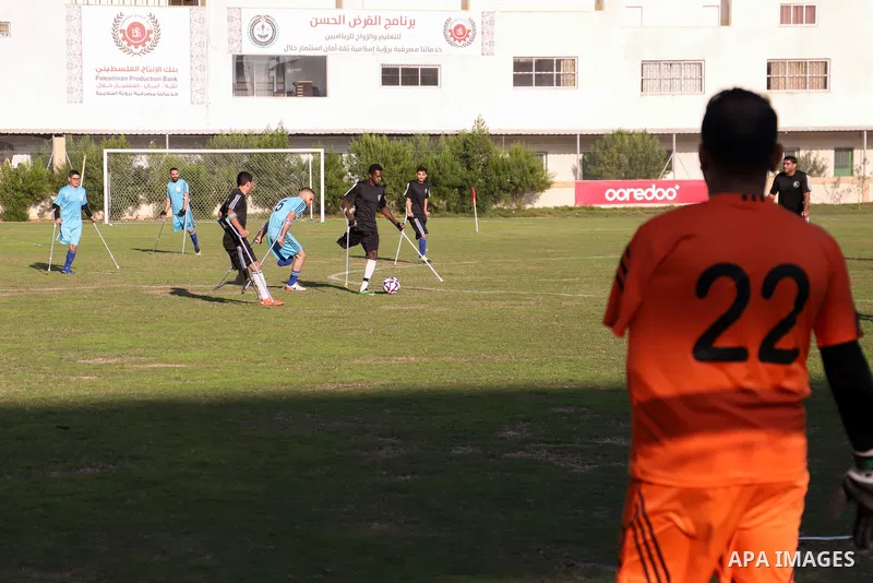 Palestinian players compete during the final of a local football championship for amputees organised by the International Committee of the Red Cross (ICRC), in Gaza City on December 20, 2022. According to The Internation...