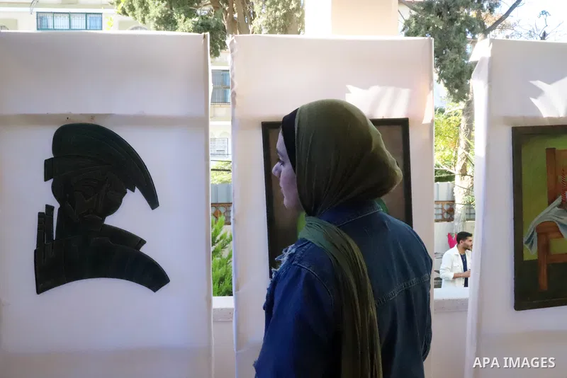 Palestinians participate in an arts and culture exhibition held at the Egyptian Community Cultural Center, in Gaza city on December 1, 2022. Photo by Youssef Abu Watfa \ apaimages