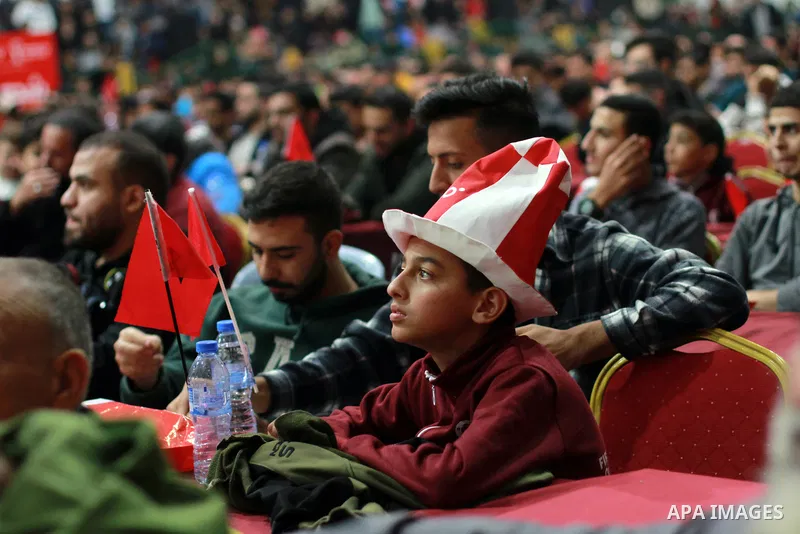Palestinian fans attend the match between Morocco VS Canada, in the Qatar World Cup FIFA 2022, via a huge screen at a public place in Gaza city on December 1, 2022. The 2022 FIFA World Cup is an association football tour...