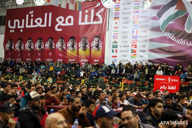Palestinian fans attend the match between Morocco VS Canada, in the Qatar World Cup FIFA 2022, via a huge screen at a public place in Gaza city on December 1, 2022. The 2022 FIFA World Cup is an association football tour...
