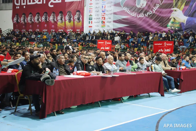 Palestinian fans attend the match between Morocco VS Canada, in the Qatar World Cup FIFA 2022, via a huge screen at a public place in Gaza city on December 1, 2022. The 2022 FIFA World Cup is an association football tour...