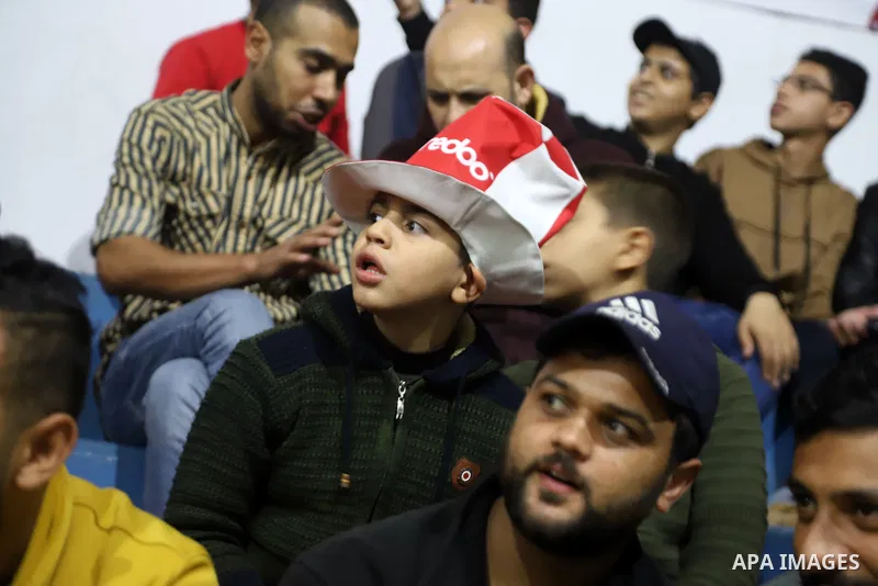 Palestinian fans attend the match between Morocco VS Canada, in the Qatar World Cup FIFA 2022, via a huge screen at a public place in Gaza city on December 1, 2022. The 2022 FIFA World Cup is an association football tour...