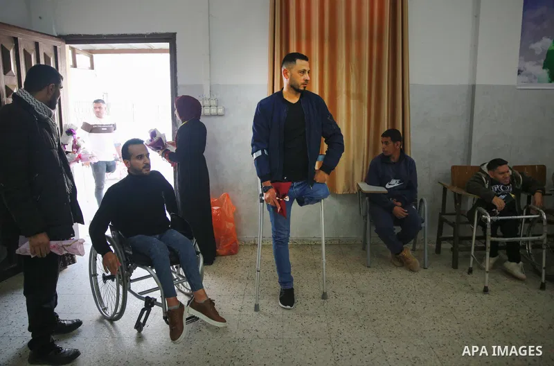 Palestinians attend a celebration on the occasion of the International Day of Disabled Persons in Gaza city on December 3, 2022. The annual observance of the International Day of Disabled Persons was proclaimed in 1992,...