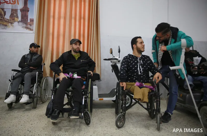 Palestinians attend a celebration on the occasion of the International Day of Disabled Persons in Gaza city on December 3, 2022. The annual observance of the International Day of Disabled Persons was proclaimed in 1992,...