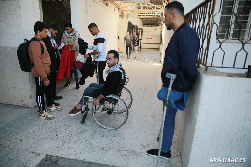 Palestinians attend a celebration on the occasion of the International Day of Disabled Persons in Gaza city on December 3, 2022. The annual observance of the International Day of Disabled Persons was proclaimed in 1992,...