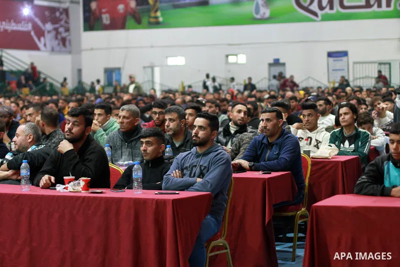 Palestinian fans attend the match between Argentina VS Australia, in the Qatar World Cup FIFA 2022, via a huge screen at a public place in Gaza city on December 3, 2022. Photo by Ali Hamad\ apaimages