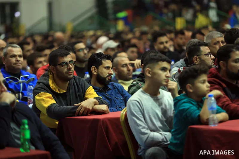 Palestinian fans attend the match between Argentina VS Australia, in the Qatar World Cup FIFA 2022, via a huge screen at a public place in Gaza city on December 3, 2022. Photo by Ali Hamad\ apaimages