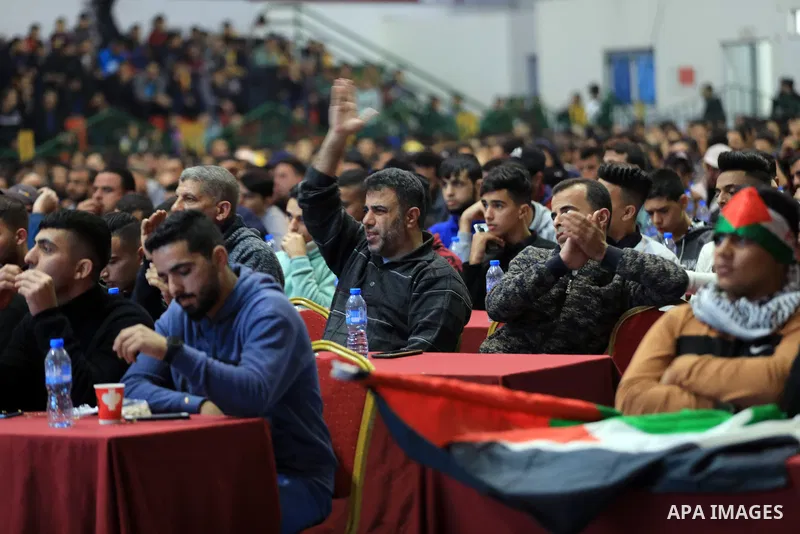 Palestinian fans attend the match between Argentina VS Australia, in the Qatar World Cup FIFA 2022, via a huge screen at a public place in Gaza city on December 3, 2022. Photo by Ali Hamad\ apaimages