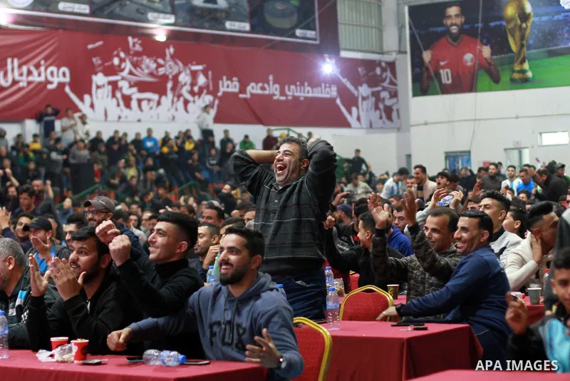 Palestinian fans attend the match between Argentina VS Australia, in the Qatar World Cup FIFA 2022, via a huge screen at a public place in Gaza city on December 3, 2022. Photo by Ali Hamad\ apaimages