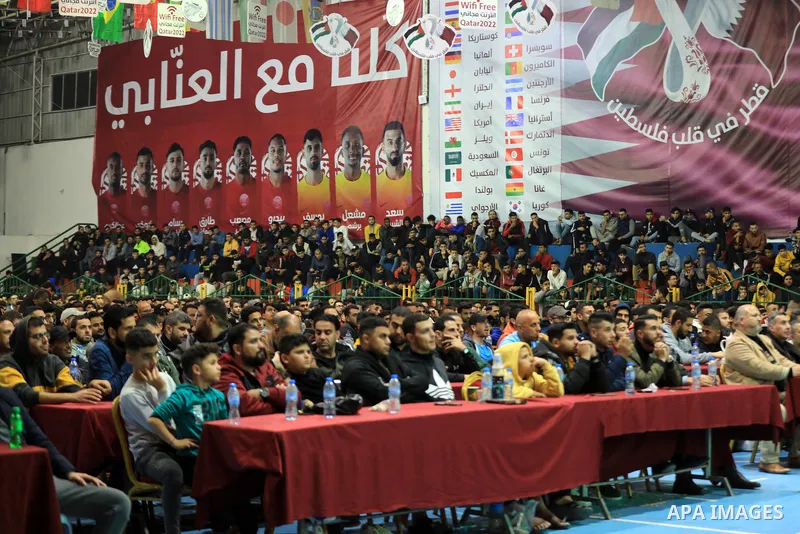 Palestinian fans attend the match between Argentina VS Australia, in the Qatar World Cup FIFA 2022, via a huge screen at a public place in Gaza city on December 3, 2022. Photo by Ali Hamad\ apaimages