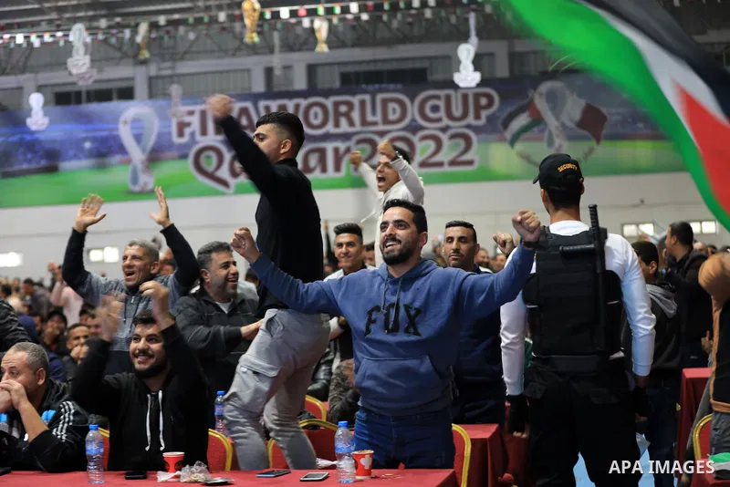 Palestinian fans attend the match between Argentina VS Australia, in the Qatar World Cup FIFA 2022, via a huge screen at a public place in Gaza city on December 3, 2022. Photo by Ali Hamad\ apaimages