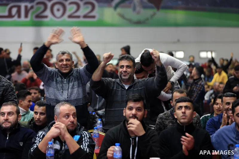 Palestinian fans attend the match between Argentina VS Australia, in the Qatar World Cup FIFA 2022, via a huge screen at a public place in Gaza city on December 3, 2022. Photo by Ali Hamad\ apaimages