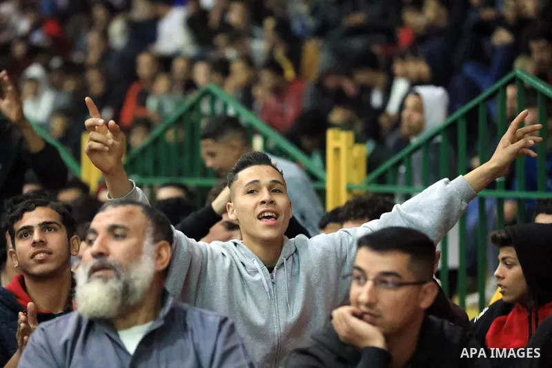 Palestinian fans attend the match between Argentina VS Australia, in the Qatar World Cup FIFA 2022, via a huge screen at a public place in Gaza city on December 3, 2022. Photo by Ali Hamad\ apaimages