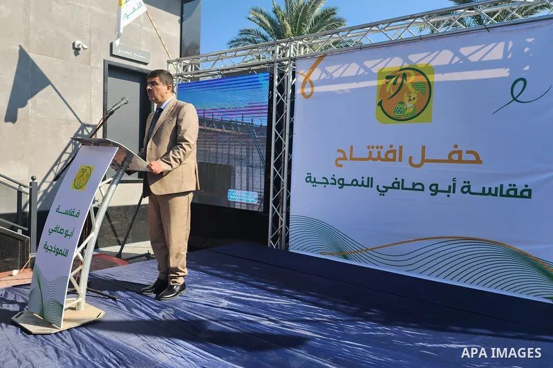 Palestinians participate in the opening of the first automatic chicken eggs incubator, in Gaza city on December 4, 2022. Photo by APA\ apaimages