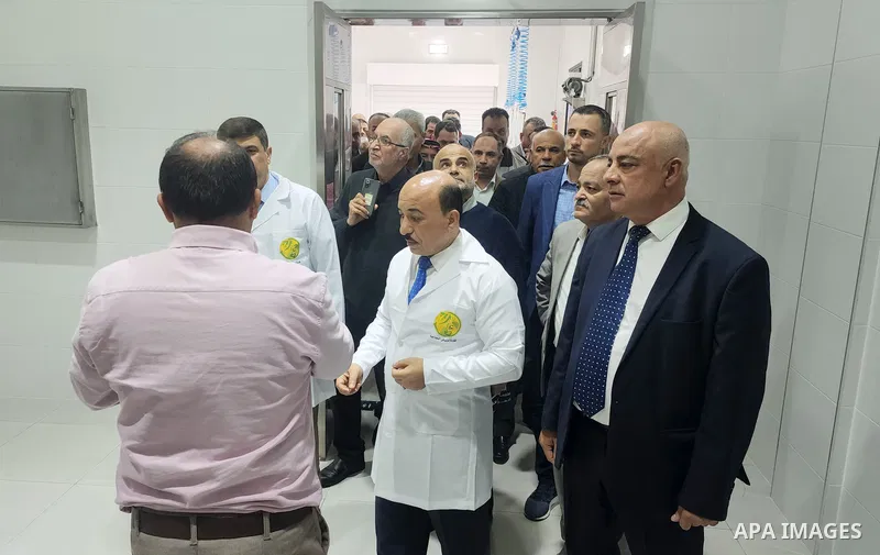 Palestinians participate in the opening of the first automatic chicken eggs incubator, in Gaza city on December 4, 2022. Photo by APA\ apaimages