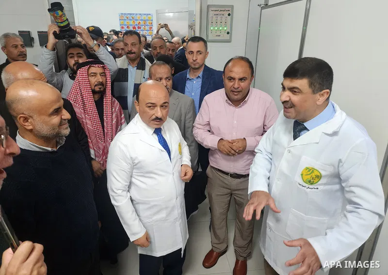 Palestinians participate in the opening of the first automatic chicken eggs incubator, in Gaza city on December 4, 2022. Photo by APA\ apaimages