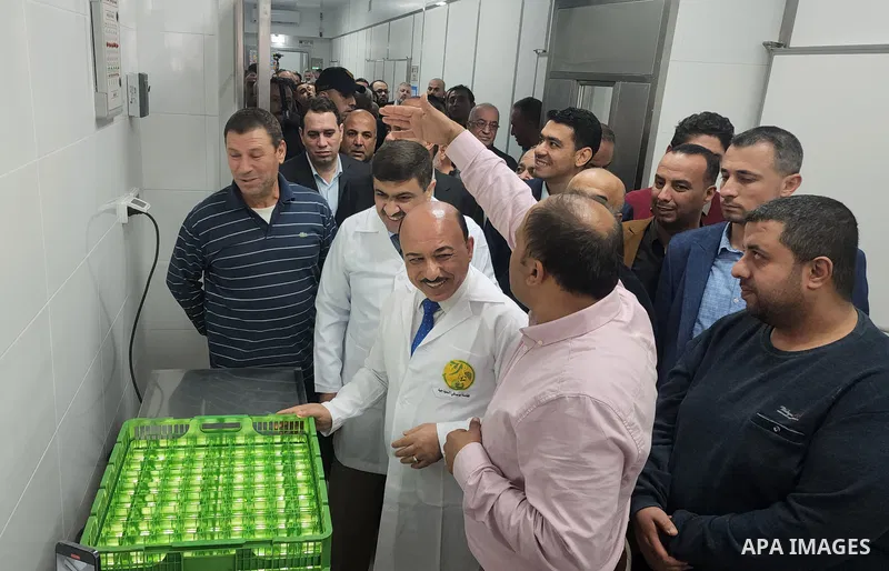 Palestinians participate in the opening of the first automatic chicken eggs incubator, in Gaza city on December 4, 2022. Photo by APA\ apaimages