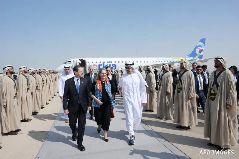 Israeli president Isaac Herzog is welcomed by UAE Minister of Foreign Affairs and International Cooperation, Sheikh Abdullah bin Zayed Al Nahyan upon his arrive to Abu Dhabi on December 5, 2022. Photo by Isaac Herzog off...