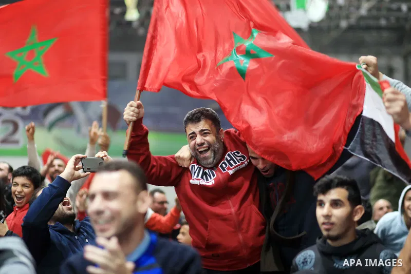 Palestinian fans celebrate after Morocco's victory over Spain in the World Cup in Qatar 2022, in Gaza city on December 6, 2022. Photo by Ali Hamad\ apaimages