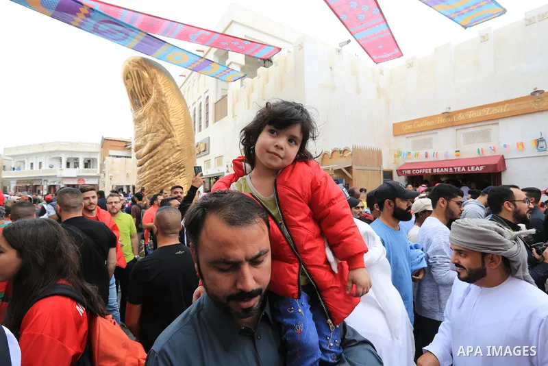 Fans gather in the streets of Doha ahead of the match Morocco vs Portugal in FIFA World Cup, in Doha, Qatar on December 10, 2022. The 2022 FIFA World Cup is an association football tournament, contested by the men's nati...