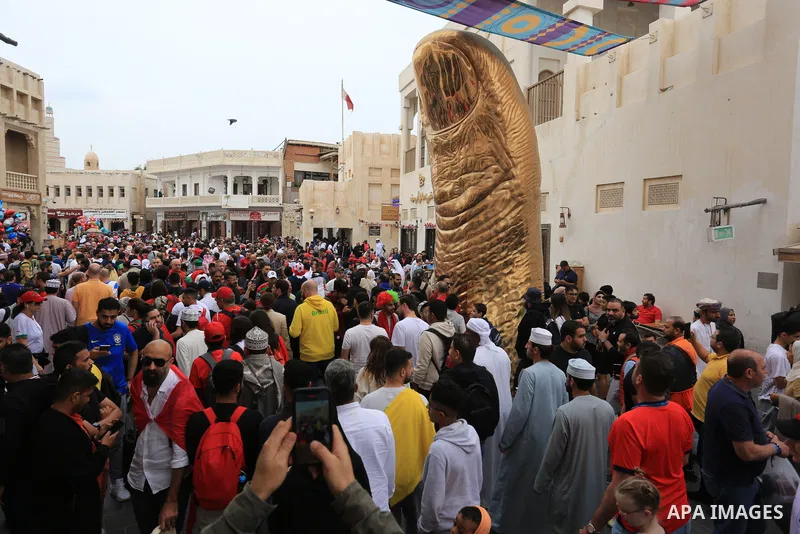 Fans gather in the streets of Doha ahead of the match Morocco vs Portugal in FIFA World Cup, in Doha, Qatar on December 10, 2022. The 2022 FIFA World Cup is an association football tournament, contested by the men's nati...