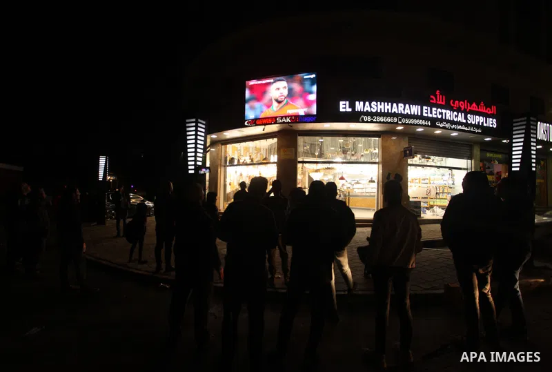 Palestinian fans gather to attend Morocco vs Portugal match in Gaza city on 10, 2022. The 2022. Photo by Omar Ashtawy\ apaimages
