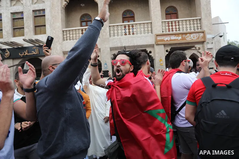 Fans gather in the streets of Doha ahead of the match Morocco vs Portugal in FIFA World Cup, in Doha, Qatar on December 10, 2022. The 2022 FIFA World Cup is an association football tournament, contested by the men's nati...