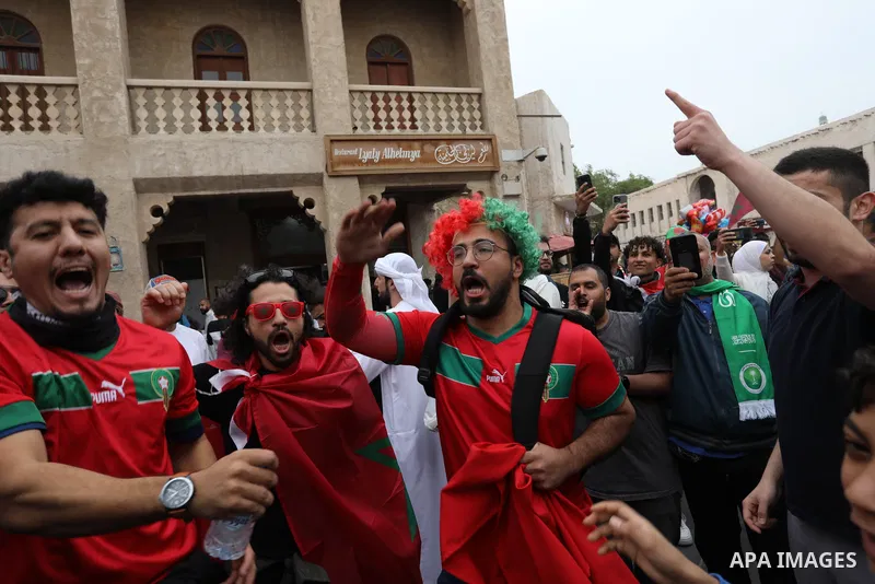 Fans gather in the streets of Doha ahead of the match Morocco vs Portugal in FIFA World Cup, in Doha, Qatar on December 10, 2022. The 2022 FIFA World Cup is an association football tournament, contested by the men's nati...