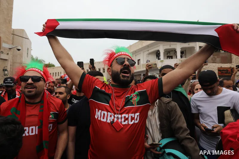 Fans gather in the streets of Doha ahead of the match Morocco vs Portugal in FIFA World Cup, in Doha, Qatar on December 10, 2022. The 2022 FIFA World Cup is an association football tournament, contested by the men's nati...