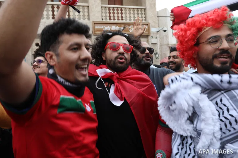 Fans gather in the streets of Doha ahead of the match Morocco vs Portugal in FIFA World Cup, in Doha, Qatar on December 10, 2022. The 2022 FIFA World Cup is an association football tournament, contested by the men's nati...