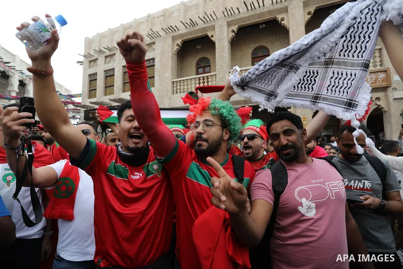 Fans gather in the streets of Doha ahead of the match Morocco vs Portugal in FIFA World Cup, in Doha, Qatar on December 10, 2022. The 2022 FIFA World Cup is an association football tournament, contested by the men's nati...