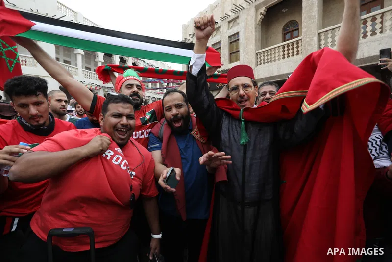Fans gather in the streets of Doha ahead of the match Morocco vs Portugal in FIFA World Cup, in Doha, Qatar on December 10, 2022. The 2022 FIFA World Cup is an association football tournament, contested by the men's nati...