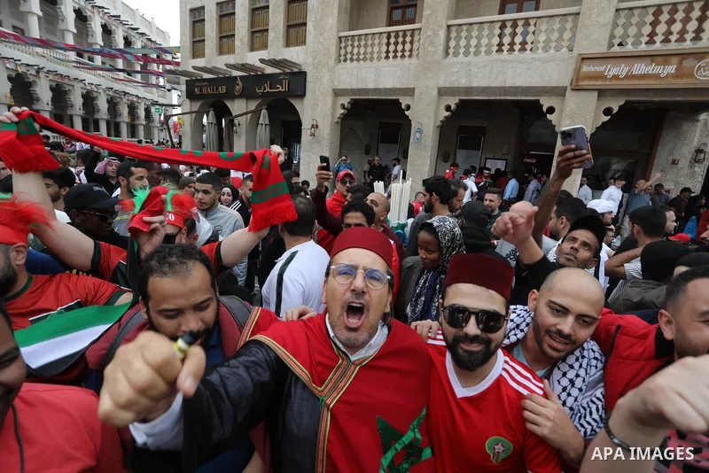 Fans gather in the streets of Doha ahead of the match Morocco vs Portugal in FIFA World Cup, in Doha, Qatar on December 10, 2022. The 2022 FIFA World Cup is an association football tournament, contested by the men's nati...