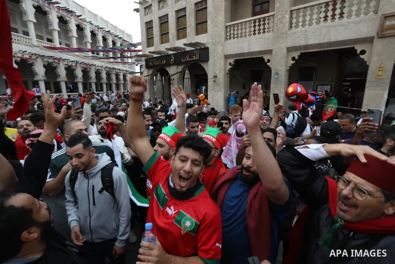 Fans gather in the streets of Doha ahead of the match Morocco vs Portugal in FIFA World Cup, in Doha, Qatar on December 10, 2022. The 2022 FIFA World Cup is an association football tournament, contested by the men's nati...