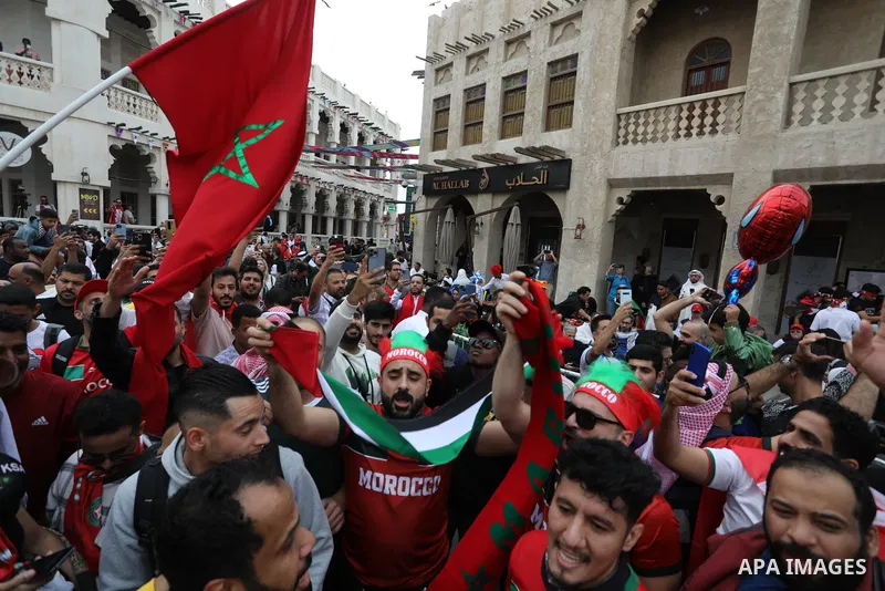 Fans gather in the streets of Doha ahead of the match Morocco vs Portugal in FIFA World Cup, in Doha, Qatar on December 10, 2022. The 2022 FIFA World Cup is an association football tournament, contested by the men's nati...