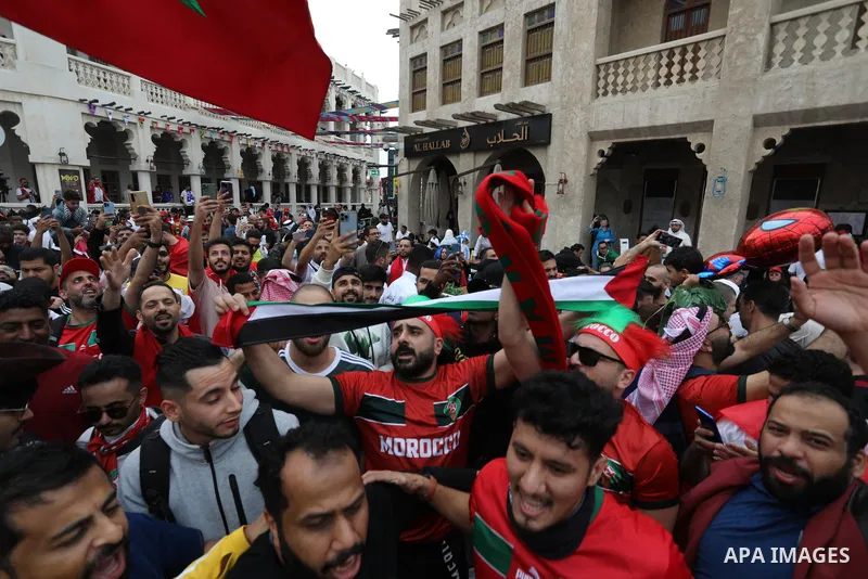Fans gather in the streets of Doha ahead of the match Morocco vs Portugal in FIFA World Cup, in Doha, Qatar on December 10, 2022. The 2022 FIFA World Cup is an association football tournament, contested by the men's nati...