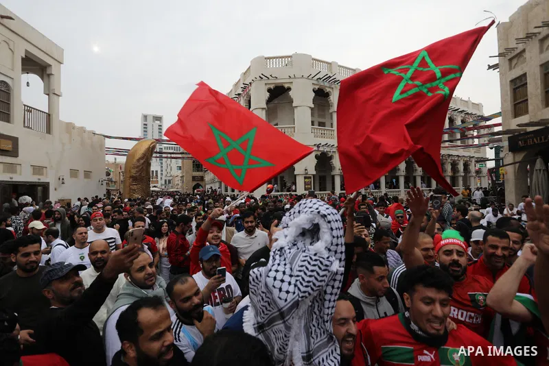 Fans gather in the streets of Doha ahead of the match Morocco vs Portugal in FIFA World Cup, in Doha, Qatar on December 10, 2022. The 2022 FIFA World Cup is an association football tournament, contested by the men's nati...