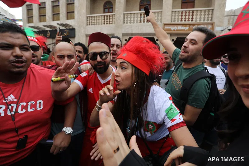 Fans gather in the streets of Doha ahead of the match Morocco vs Portugal in FIFA World Cup, in Doha, Qatar on December 10, 2022. The 2022 FIFA World Cup is an association football tournament, contested by the men's nati...