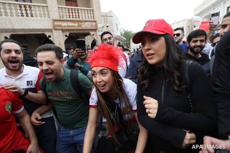 Fans gather in the streets of Doha ahead of the match Morocco vs Portugal in FIFA World Cup, in Doha, Qatar on December 10, 2022. The 2022 FIFA World Cup is an association football tournament, contested by the men's nati...
