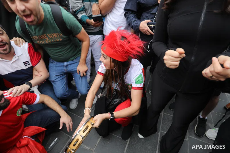 Fans gather in the streets of Doha ahead of the match Morocco vs Portugal in FIFA World Cup, in Doha, Qatar on December 10, 2022. The 2022 FIFA World Cup is an association football tournament, contested by the men's nati...