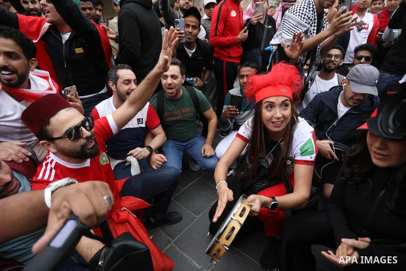 Fans gather in the streets of Doha ahead of the match Morocco vs Portugal in FIFA World Cup, in Doha, Qatar on December 10, 2022. The 2022 FIFA World Cup is an association football tournament, contested by the men's nati...
